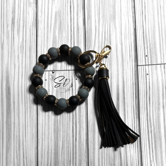 7” Stretchy Black and Grey Silicone Wristlet with Tassel - Picture 2 of 5